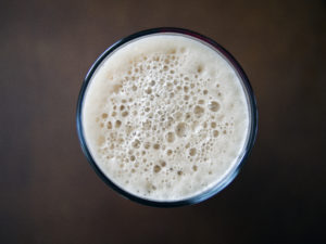 artistic photo of a craft beer's head