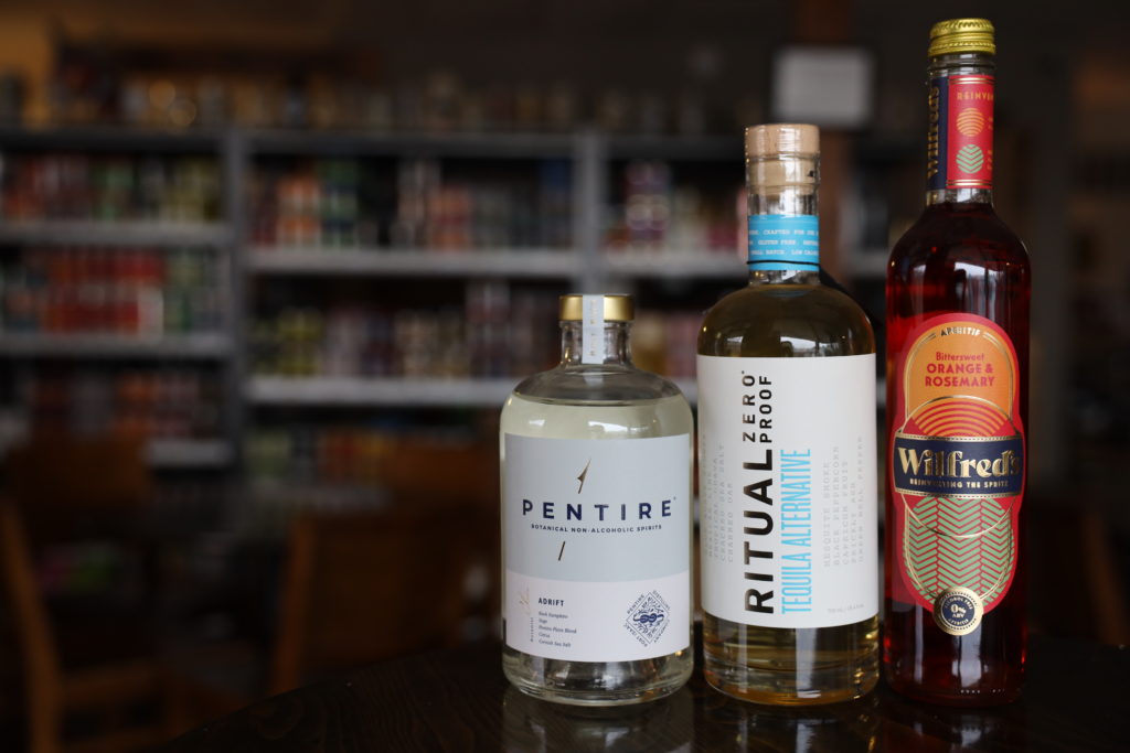 Bottles of Pentire Gin, Ritual tequila, and Wilfred's aperitif at Das Stahl Bierhaus